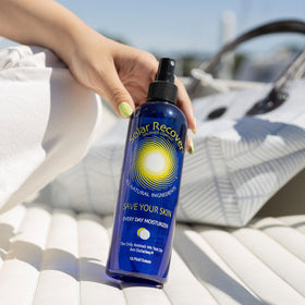Solar Recover bottles next to sunglasses to show 12oz and 8oz size scale