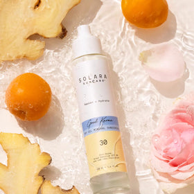 Solara Good Karma held in hand to show compact travel-friendly size