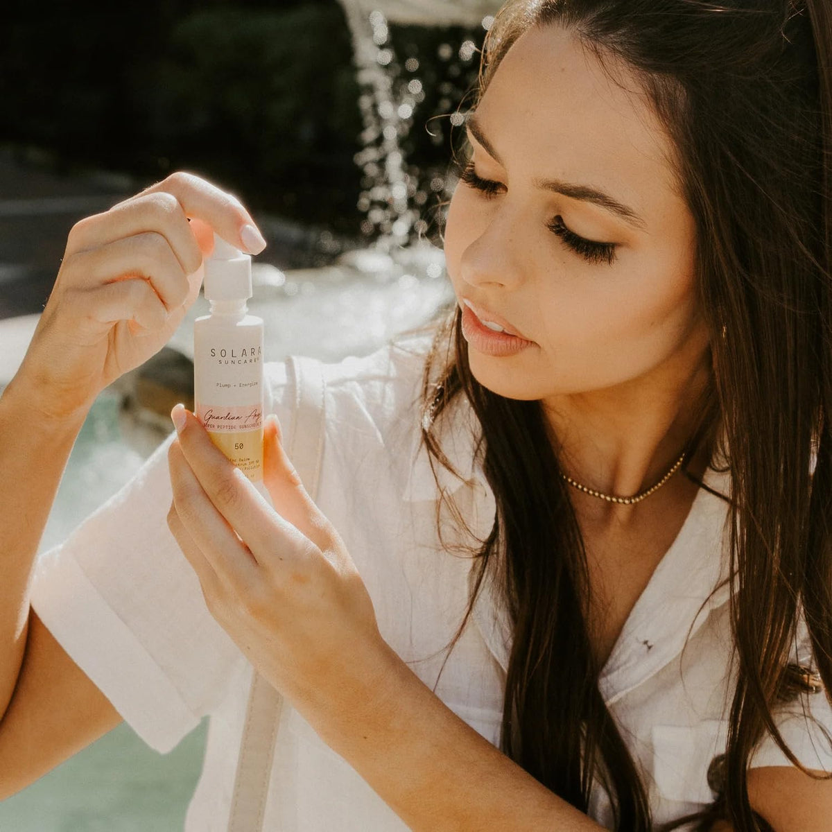 Solara Suncare applied on hand demonstrating non-greasy absorption benefit