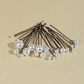SOLENY pearl pins placed in bridal updo adding elegant finishing touch