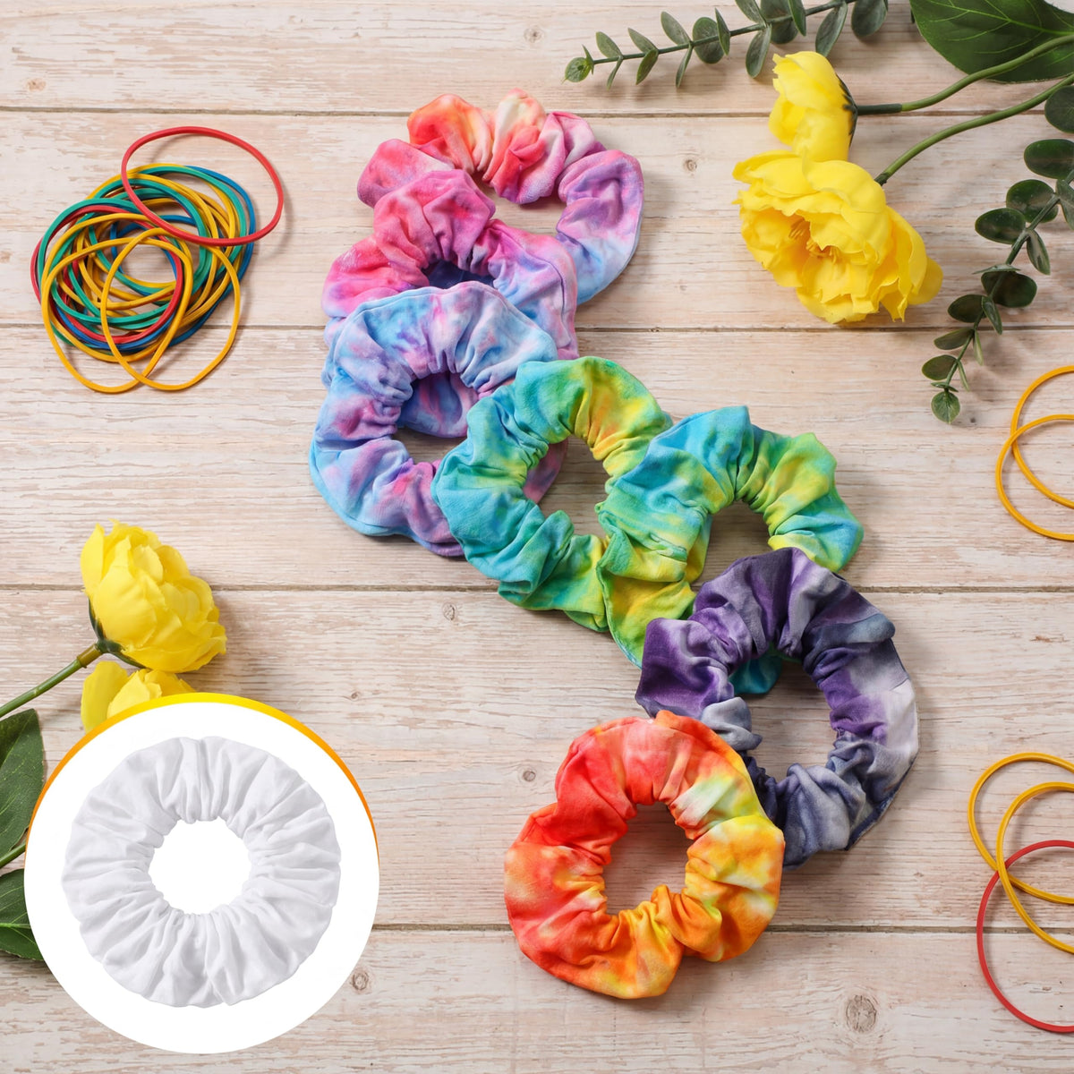 Sosation layout of small rubber bands with scrunchies demonstrating pattern-making tools