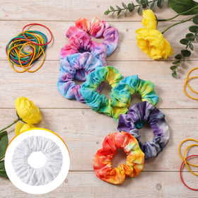 Sosation layout of small rubber bands with scrunchies demonstrating pattern-making tools