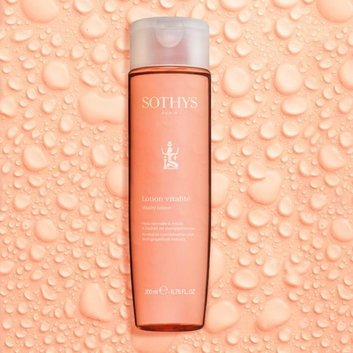 SOTHYS Vitality Lotion on cotton pad showing gentle cleansing benefit