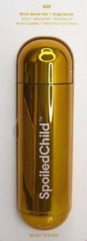 SpoiledChild applying serum to scalp to support fuller-looking hair