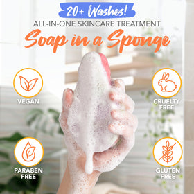 Spongeables papaya lathered sponge in hand demonstrating rich foam