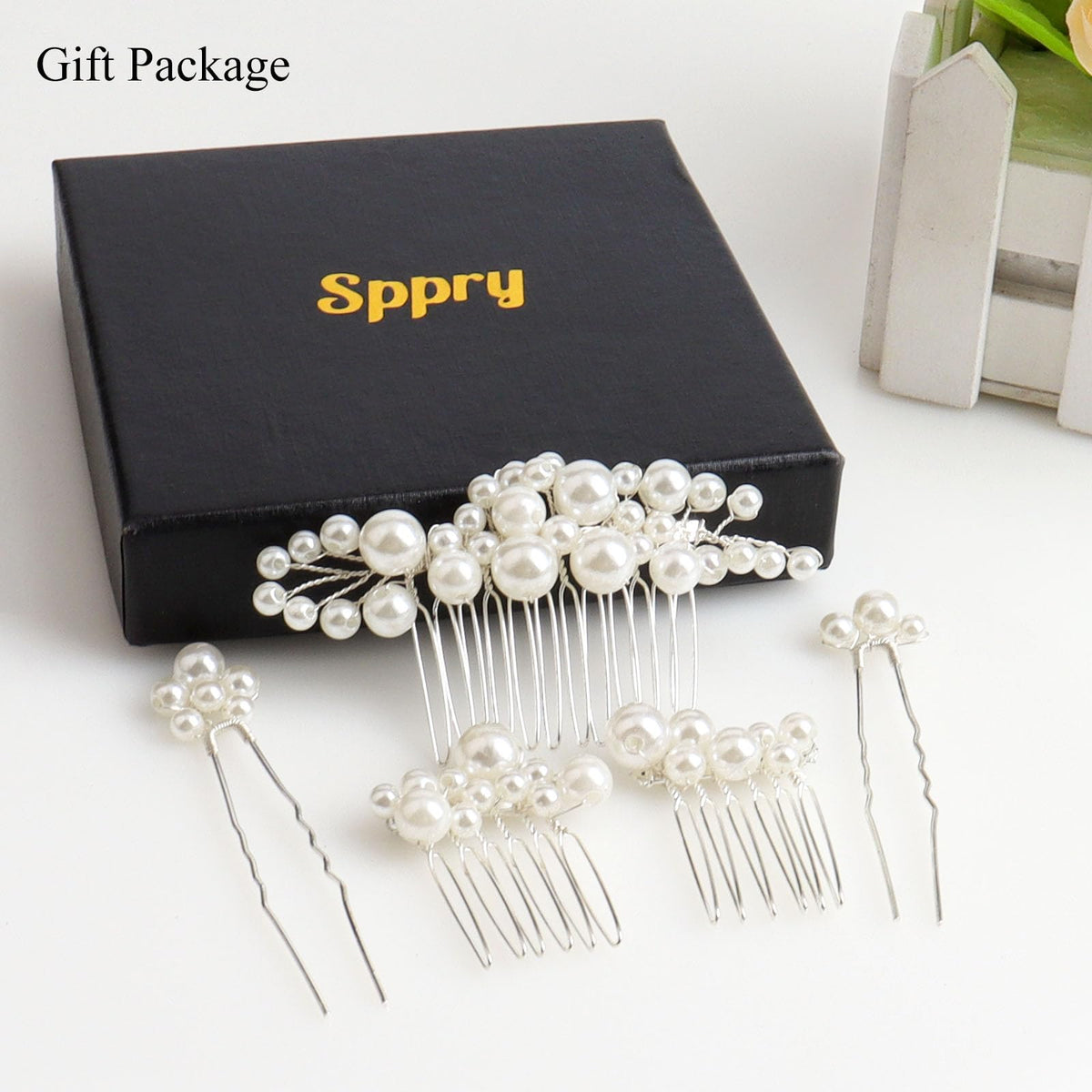 Sppry bridal model wearing combs with veil demonstrating polished ceremony look