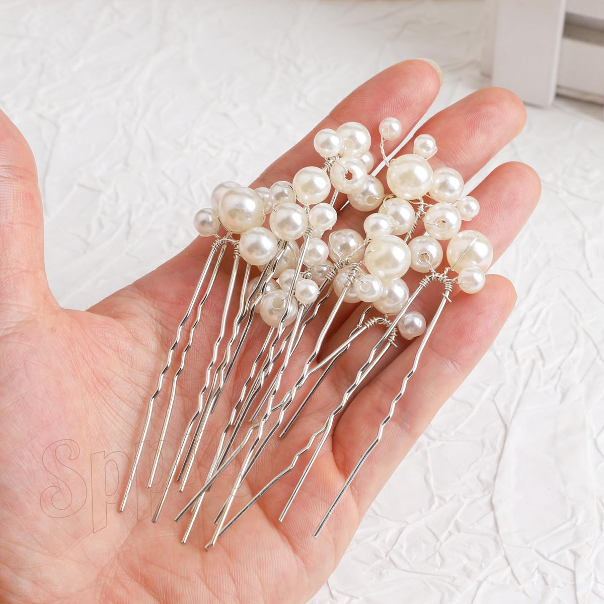 Sppry gift box with label and nine pins arranged, ideal gifting benefit
