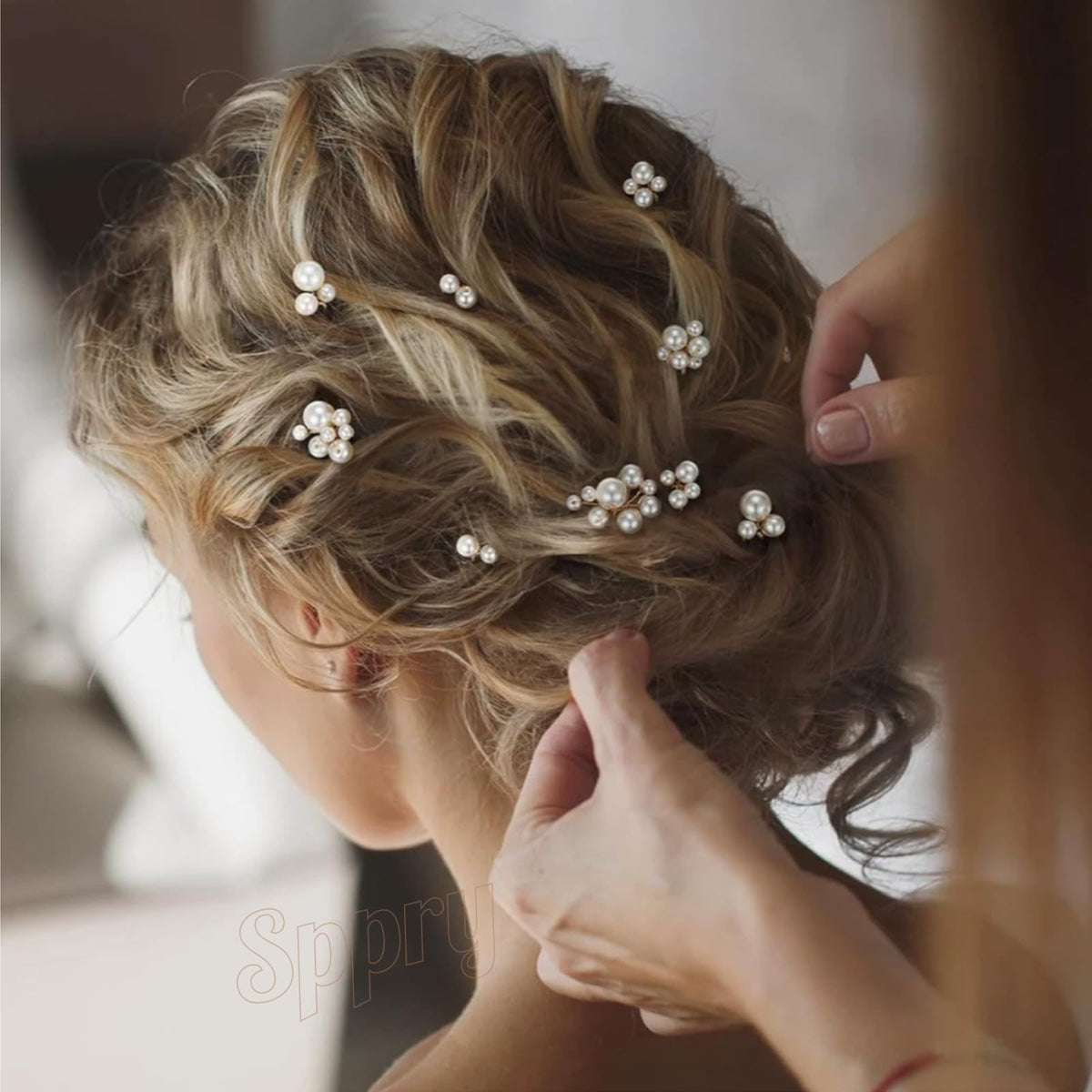 Sppry hair pins securing a bridal bun, elegant hold benefit