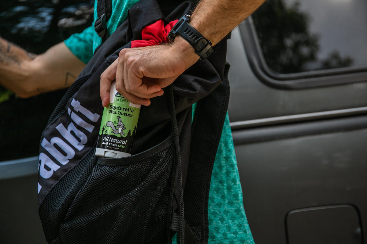 Squirrel's Nut Butter in a trail pack pocket highlighting grab-and-go readiness