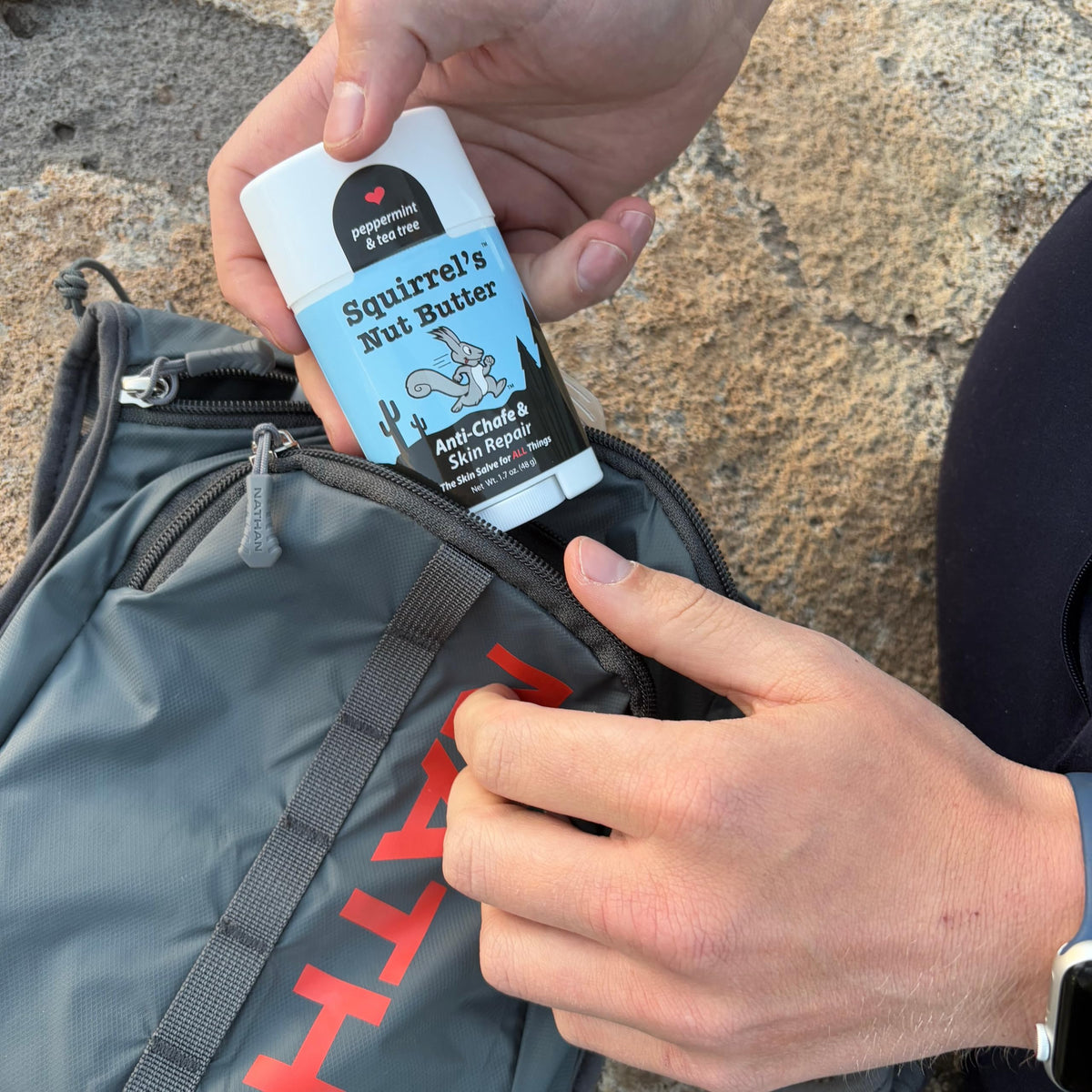 Squirrel's Nut Butter applied to inner thigh demonstrating chafe prevention for runners