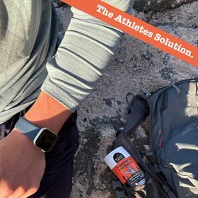 Squirrel's Nut Butter being applied to thigh demonstrating friction prevention for runners