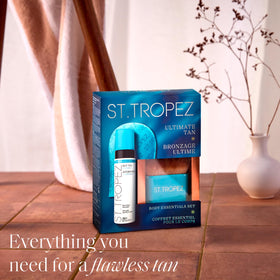 st.tropez application demonstration model using mitt to achieve an even sun-kissed look