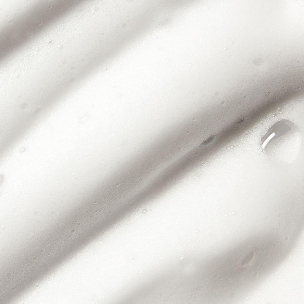 St.Tropez face mist spraying from bottle, provides instant radiant hydration