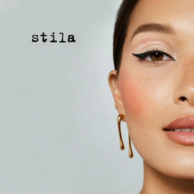 stila pen cap removed with tip detail to show easy storage and consistent flow