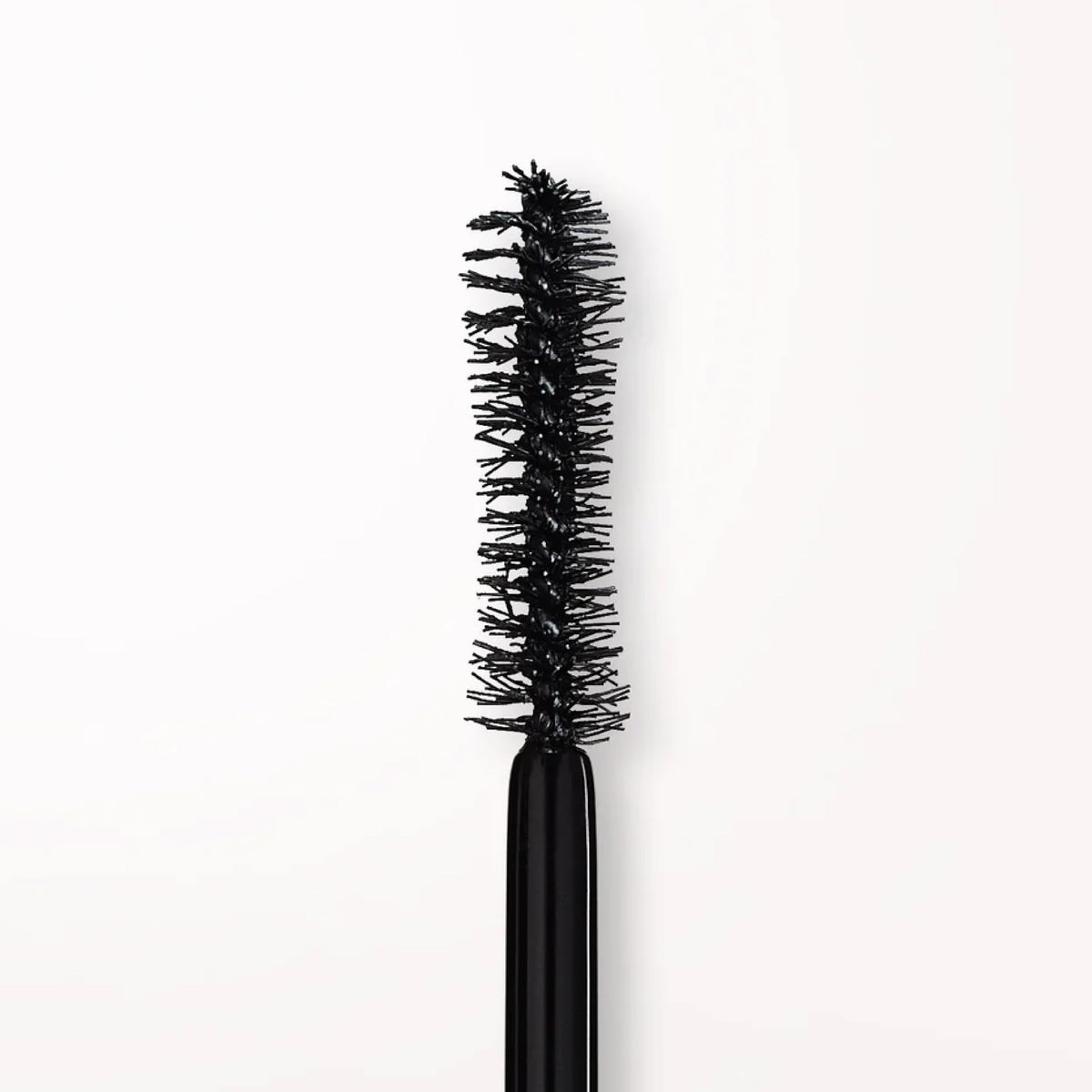 stila model applying mascara illustrating easy use and bold eye impact