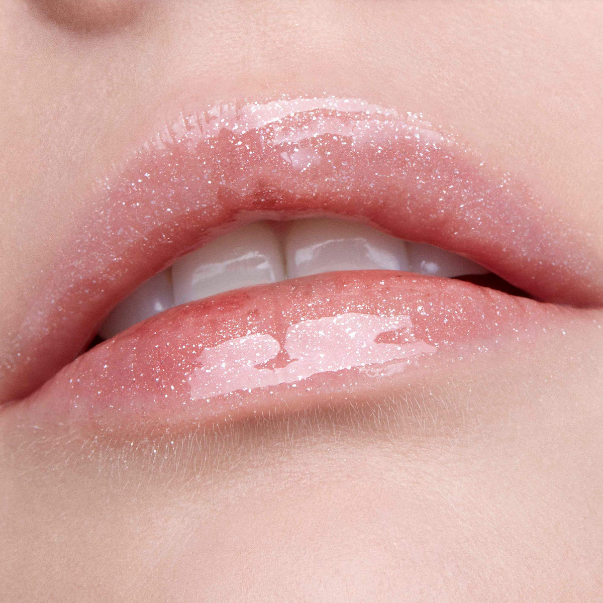 stila Kitten texture swipe on skin highlighting glossy, hydrating finish