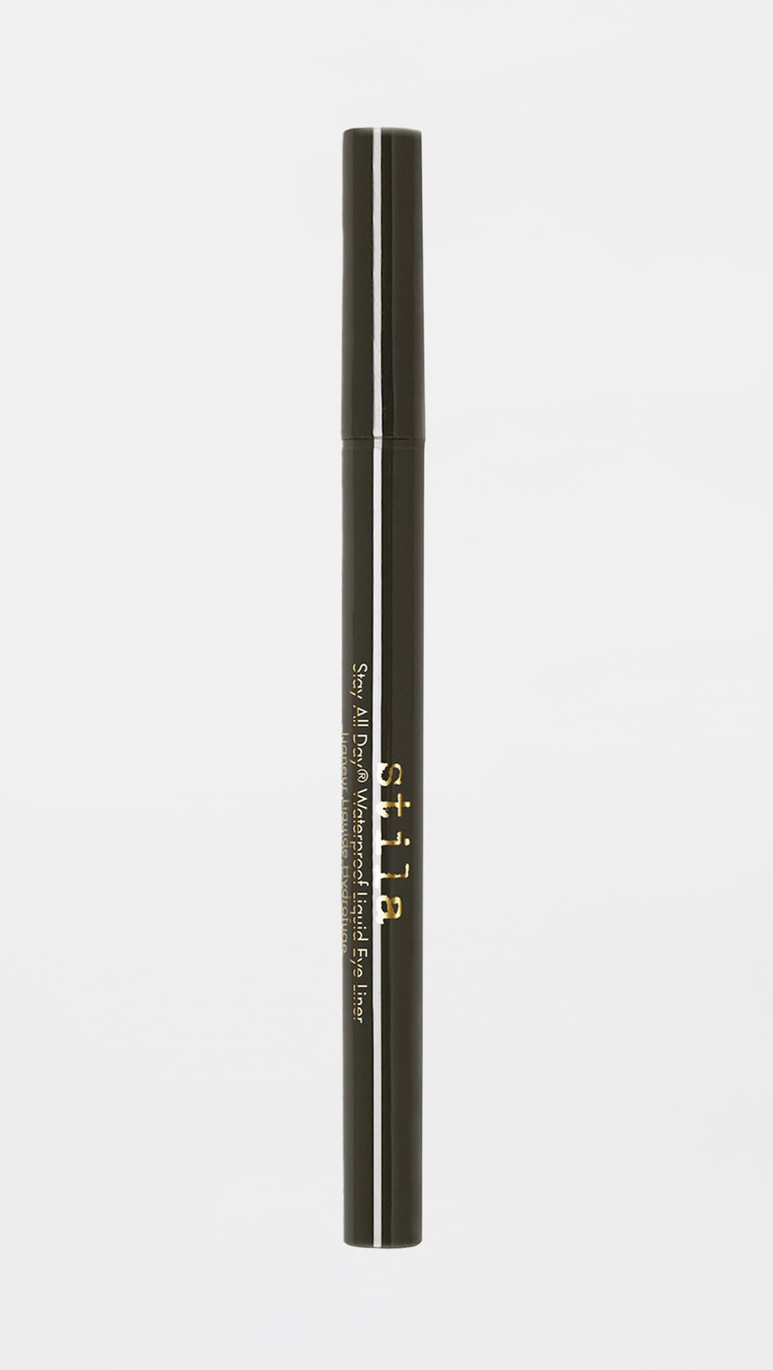 stila liner in a makeup bag styled on table for on-the-go touch-ups