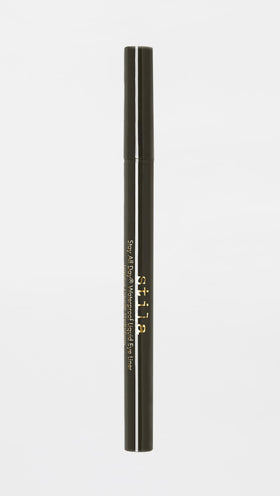 stila liner in a makeup bag styled on table for on-the-go touch-ups