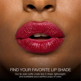 stila Calligraphy Lip Stain lifestyle flatlay with tools illustrates versatile use for on-the-go touchups