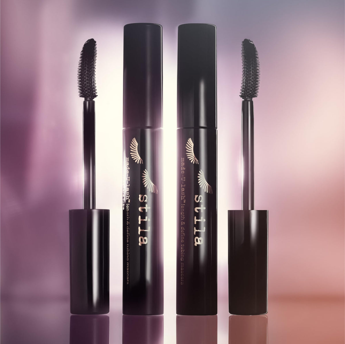 stila Made-U-Lash lifestyle shot applying mascara at mirror for polished look