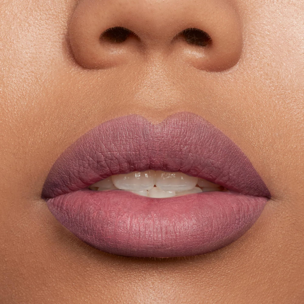 stila ingredients label showing vitamin E and avocado oil for softer, nourished lips