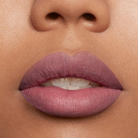 stila ingredients label showing vitamin E and avocado oil for softer, nourished lips