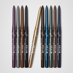 stila pencil held in hand for scale showing compact travel-ready convenience