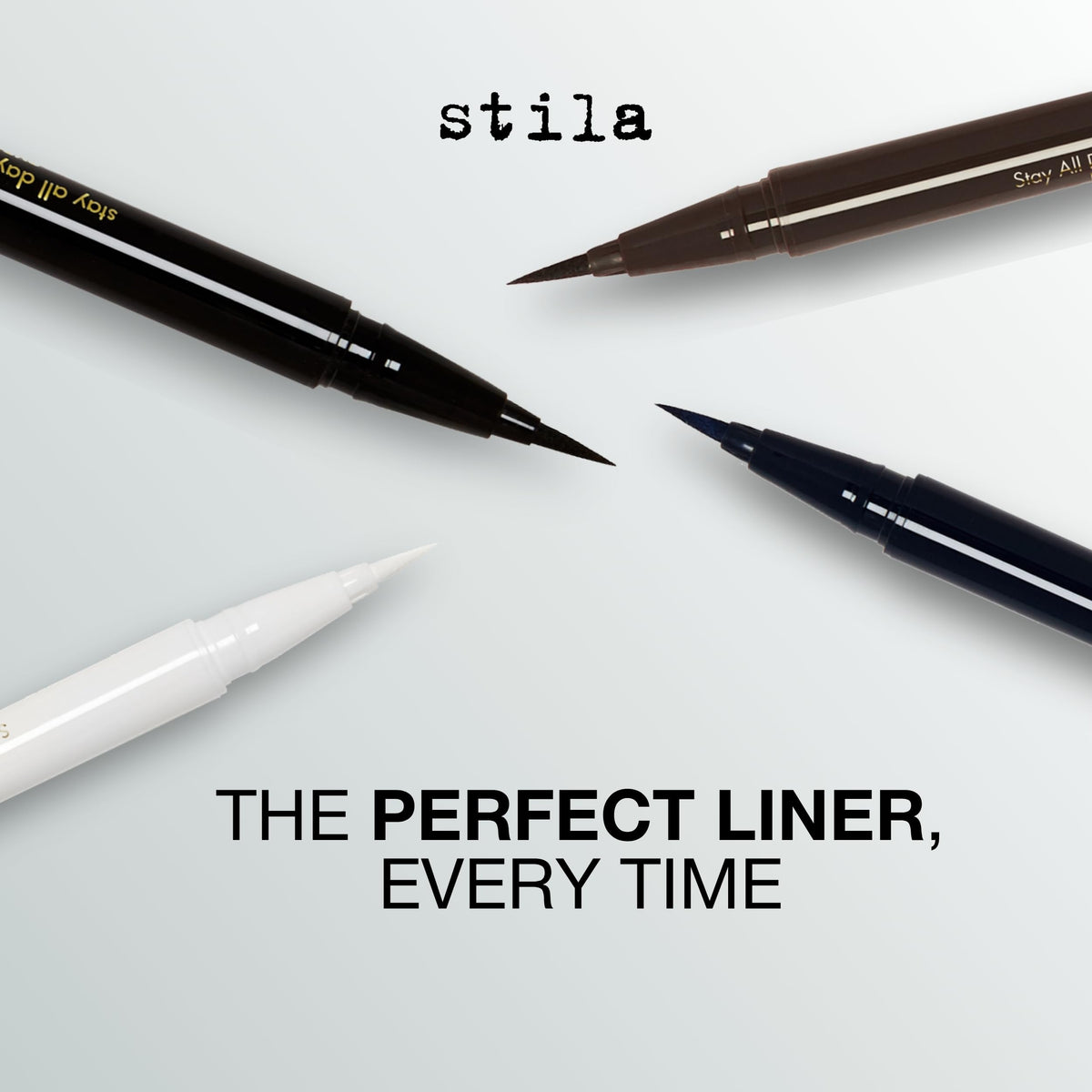 stila eyeliner beside a coin to show compact size and travel convenience