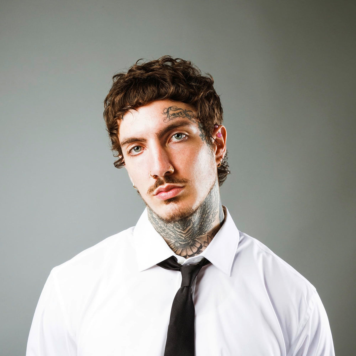 STMNT cream massaged into beard showcasing softness and tame benefit