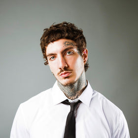 STMNT cream massaged into beard showcasing softness and tame benefit