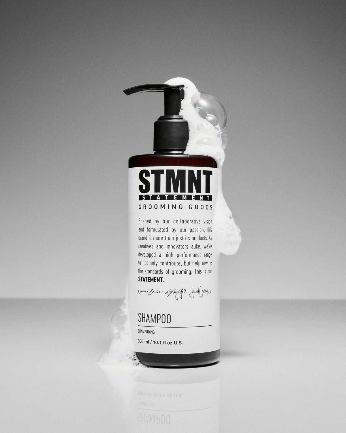 STMNT Hydro Shampoo pump close-up highlighting easy dispensing