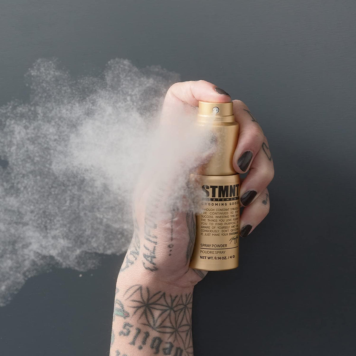STMNT spray powder nozzle detail highlighting easy application and precision