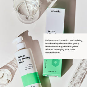 Stratia bottle in hand showing size and 4 fl oz scale for purchase confidence