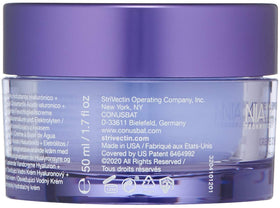 StriVectin cream applied on hand, demonstrating fast-absorbing hydration and smooth finish