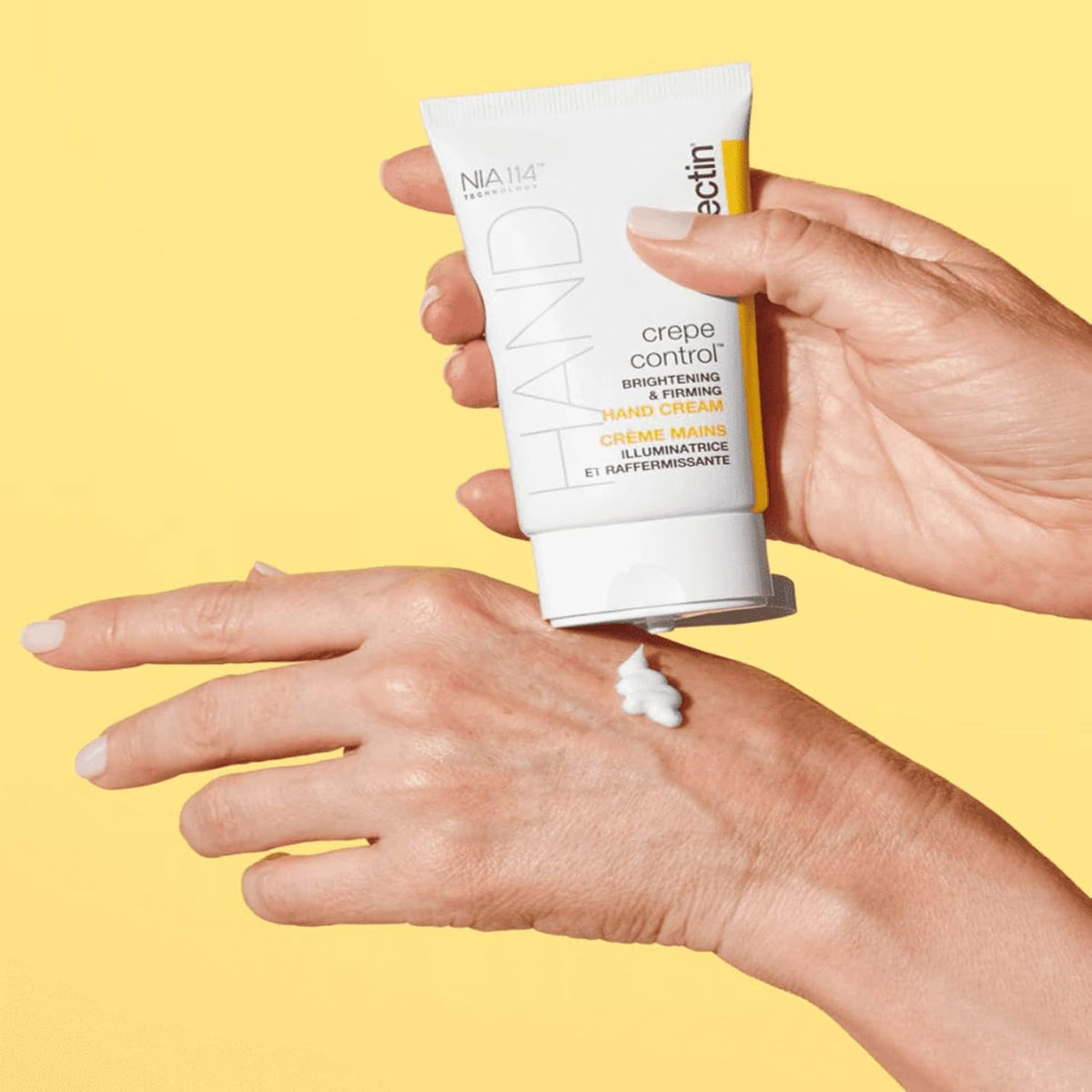 StriVectin hand cream being applied to hands to improve crepey look
