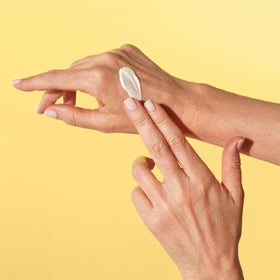 StriVectin visible before and after hands showing smoother skin tone