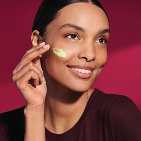 StriVectin being applied to face indicating gentle application and overnight renewal