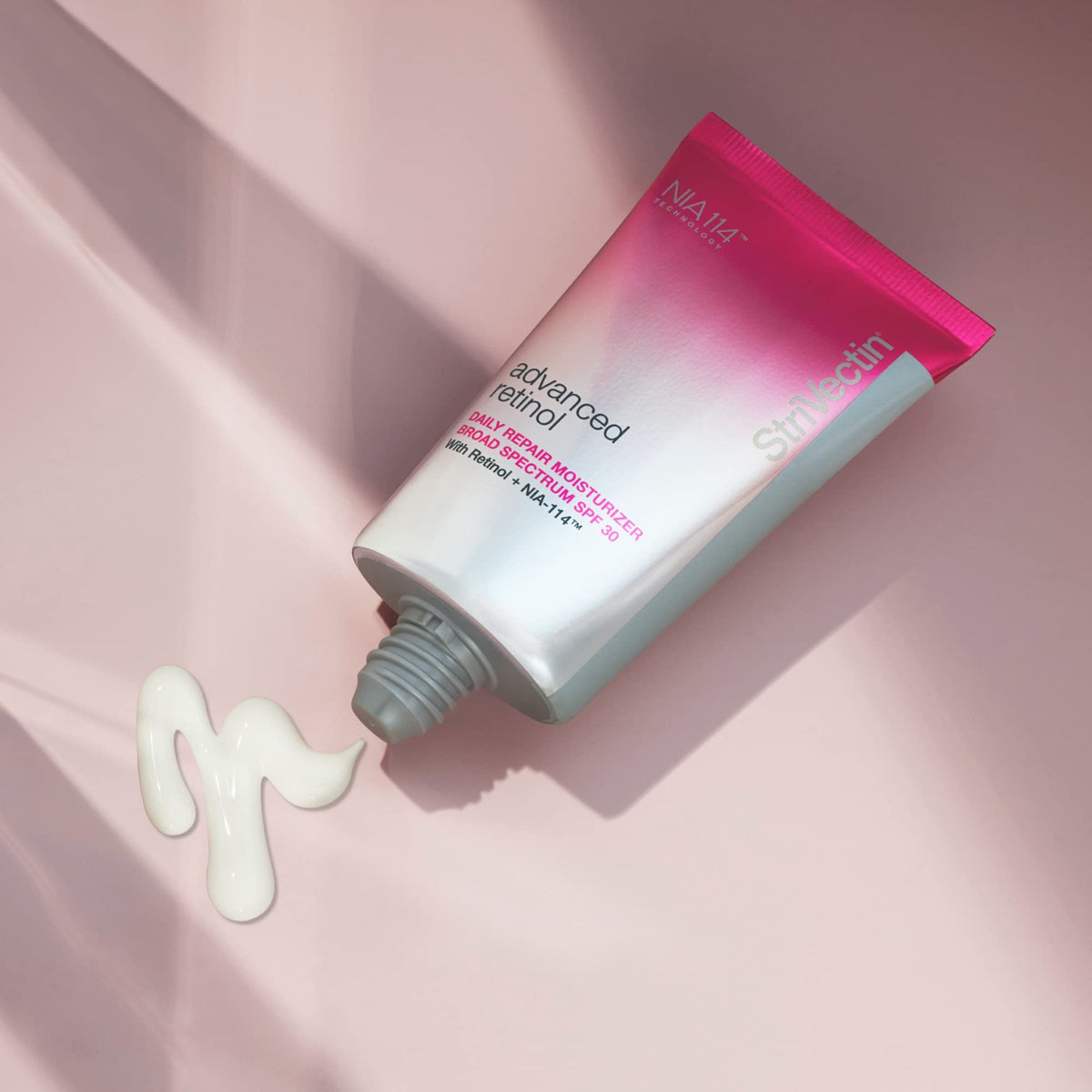 StriVectin jar in hand to show size and travel-friendly benefit