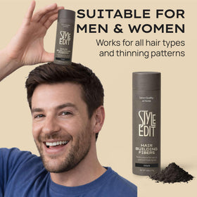 Style Edit lifestyle image of man applying fibers showing quick touch-up benefit