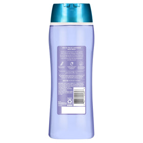 Suave on a shower shelf in a bathroom lifestyle scene for everyday routine benefit