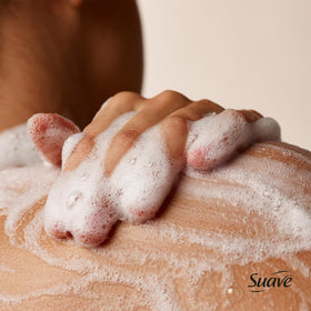 Suave bottle lather texture demonstrating creamy foam and gentle cleansing