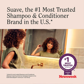 Suave bottles beside a hairbrush to show scale and generous 22.5 oz family size