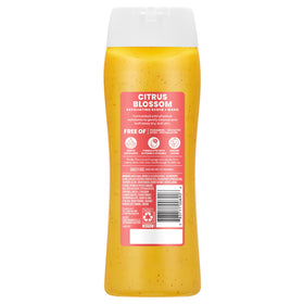 Suave bottle in shower being used to cleanse and smooth skin