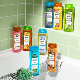 Suave bottles on family bathroom shelf illustrating multi-bottle value