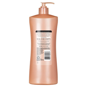 Suave keratin infusion bottle in shower demonstrating in-use benefit