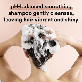 Model with smooth, frizz-controlled hair after using Suave for silky finish