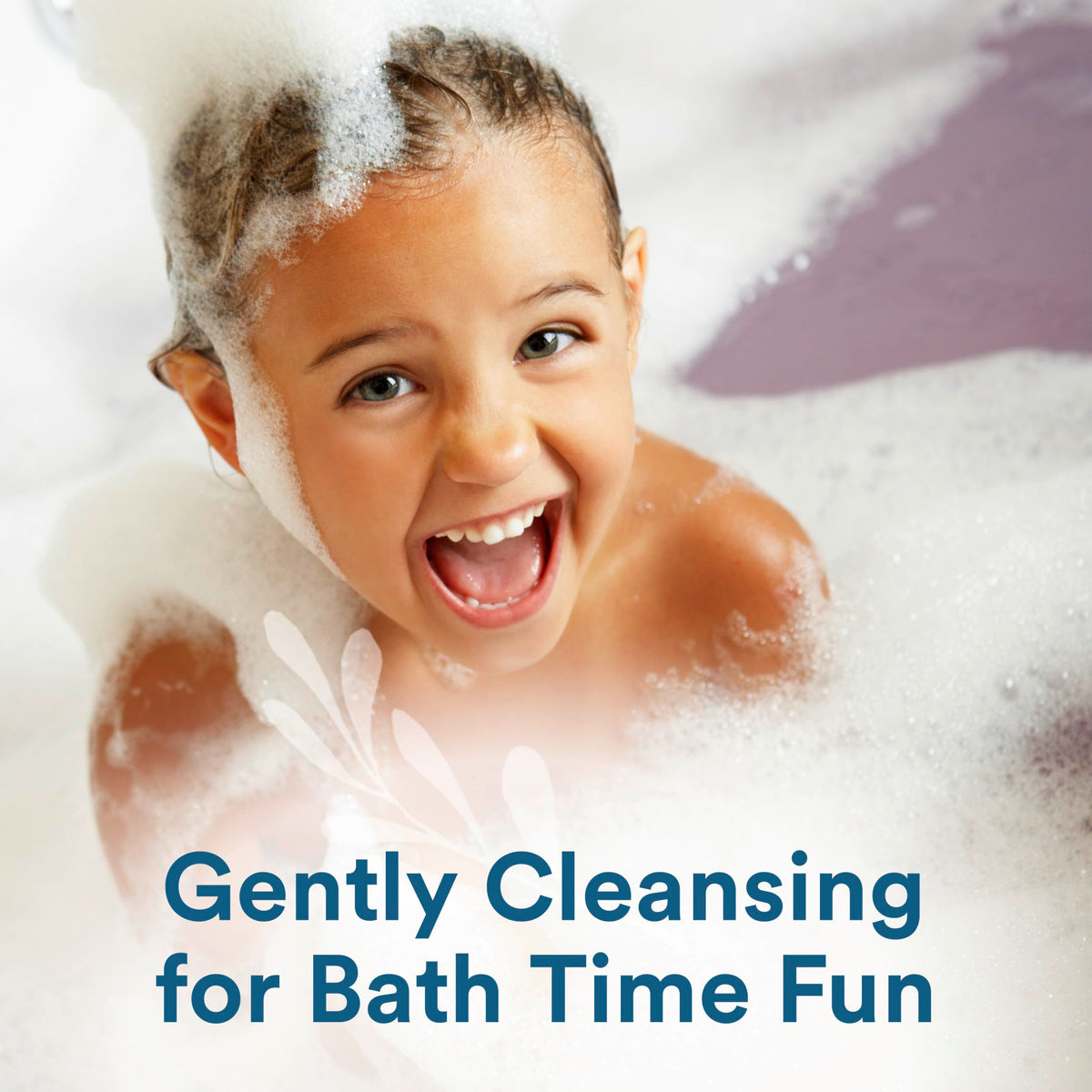Child using Suave kids 3-in-1 in bathtub for faster, tear-free bath time
