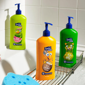 Suave kids bottle next to a toy for size-scale and travel-friendly benefit