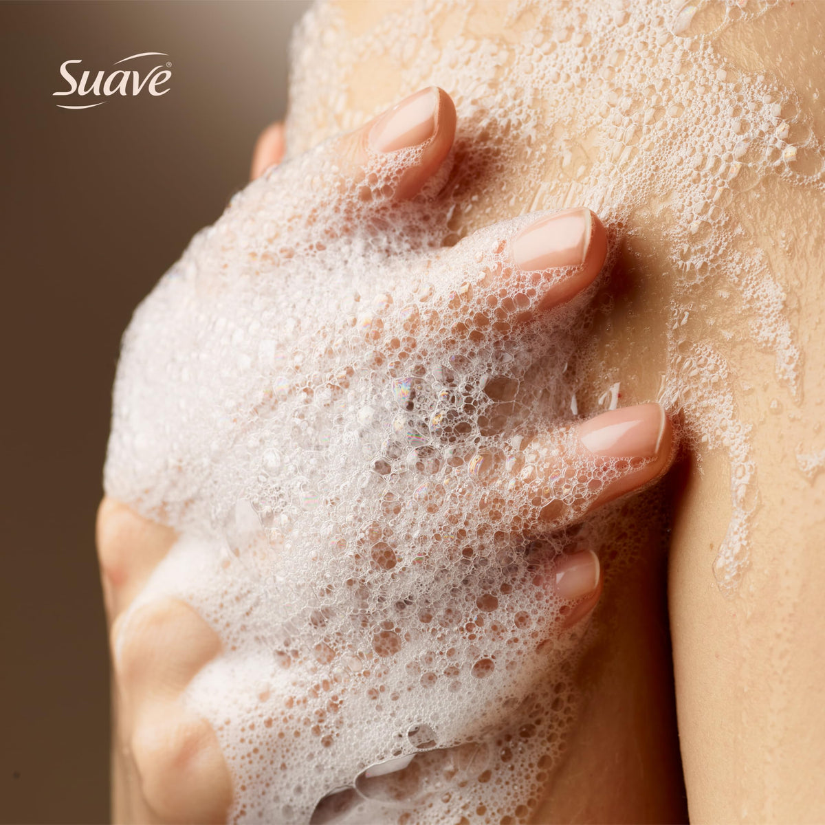Suave label close-up listing vitamin E and aloe extracts for hydrated skin