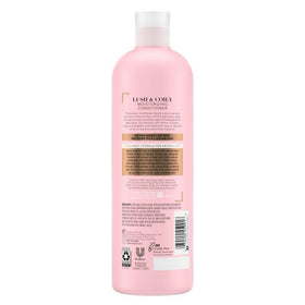Suave lifestyle image of defined curls showing shine and frizz control benefit